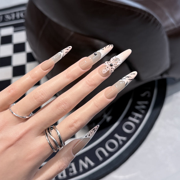 Artistic Stiletto Nail Art Set with Elegant Decorative Elements Stornfield