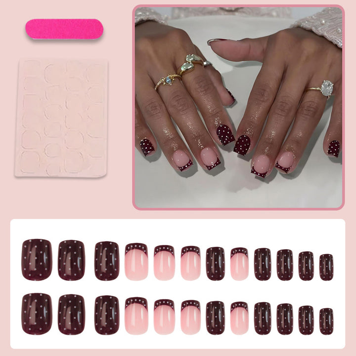 Art nail set with elegant French tips and playful accents Stornfield