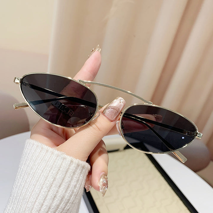 Ladies fashionable sunglasses in elegant oval design Stornfield