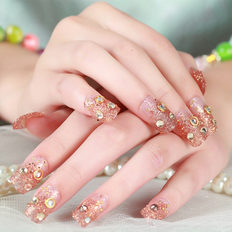 Artificial nails with elegant flower and rhinestone design Stornfield