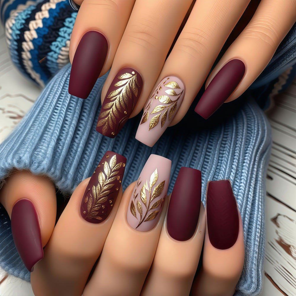 Elegant artificial nails with gold decoration Stornfield