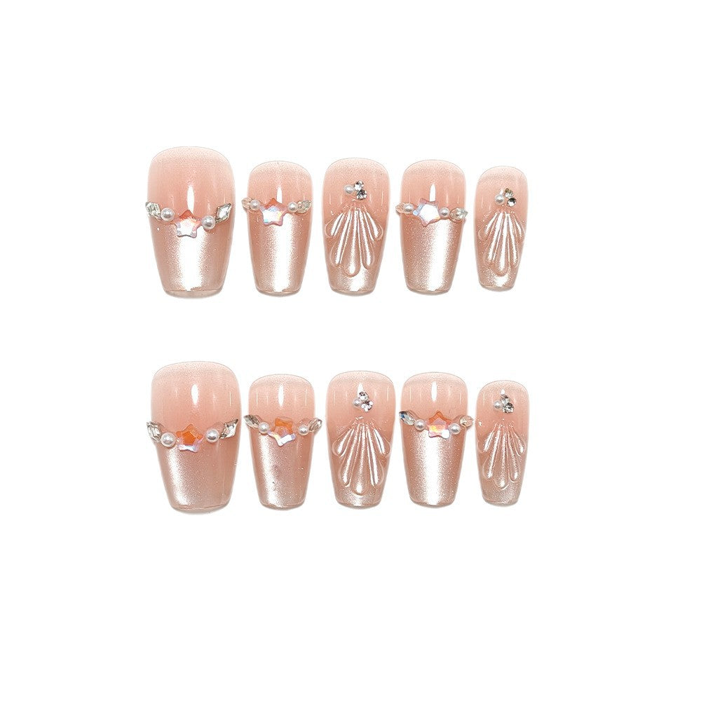 Exquisite artificial nails with glitter and pearl accents Stornfield