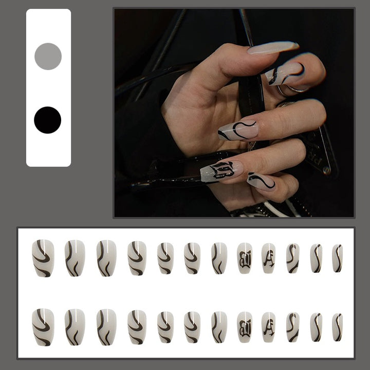 Acrylic nail set with elegant design and creative accents Stornfield