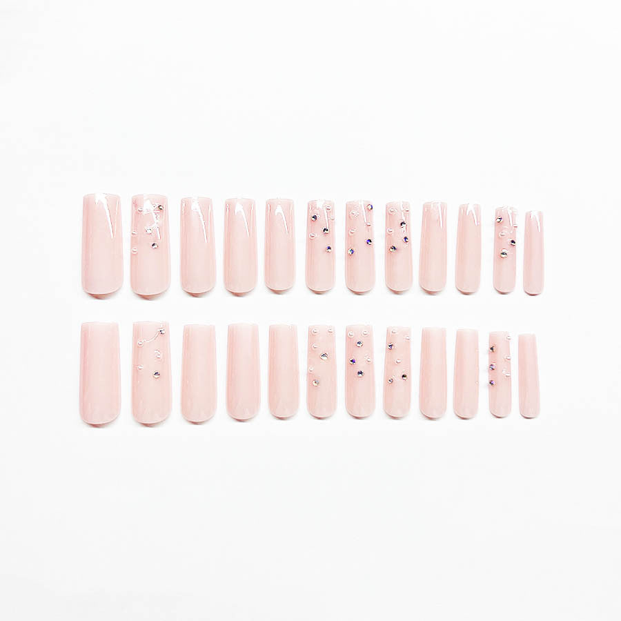 Acrylic nail set with sparkling rhinestone embellishments Stornfield