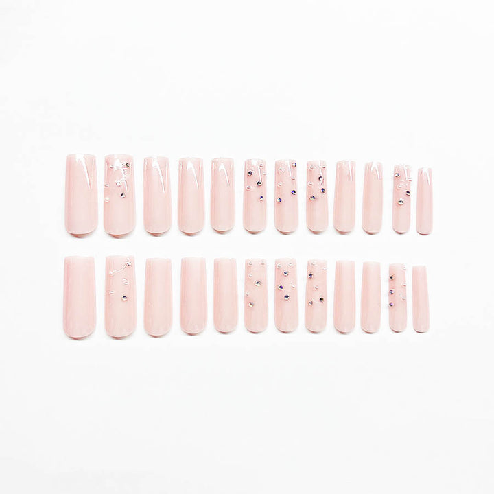 Acrylic nail set with sparkling rhinestone embellishments Stornfield