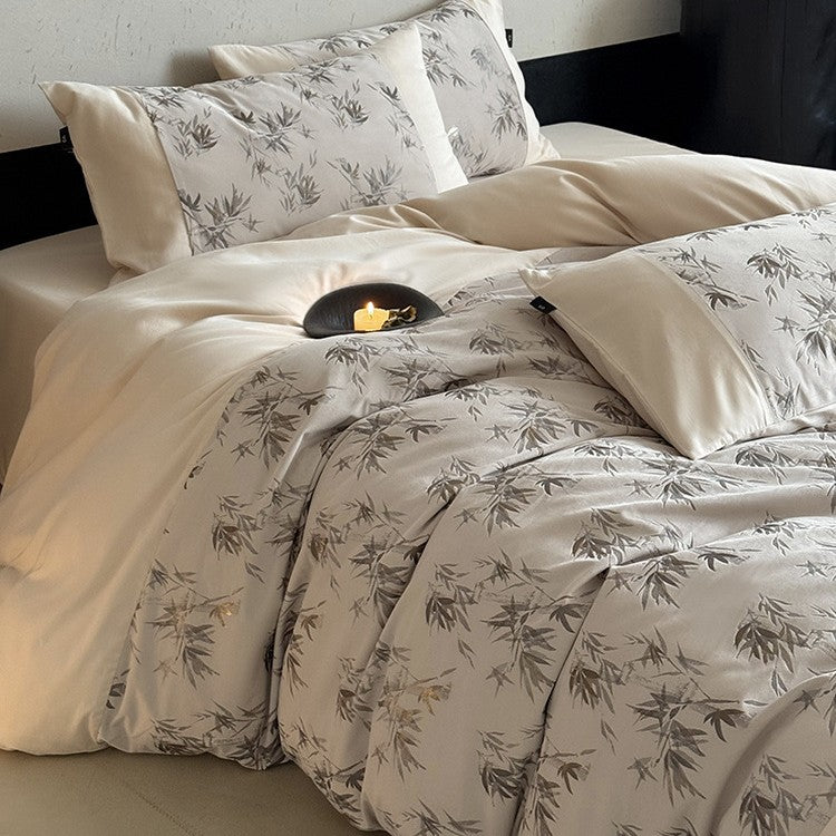 Satin bedding set with fine bamboo leaf print and silky soft finish