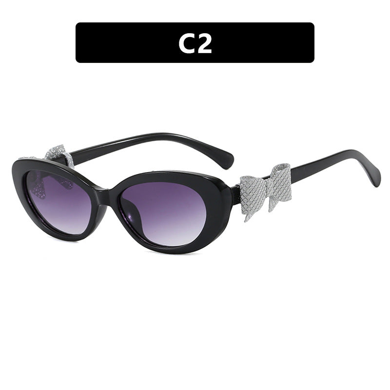 Women's fashionable sunglasses with playful bow design Stornfield