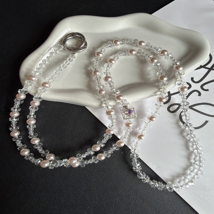 Elegant Pearl and Crystal Eyewear Holder Stornfield
