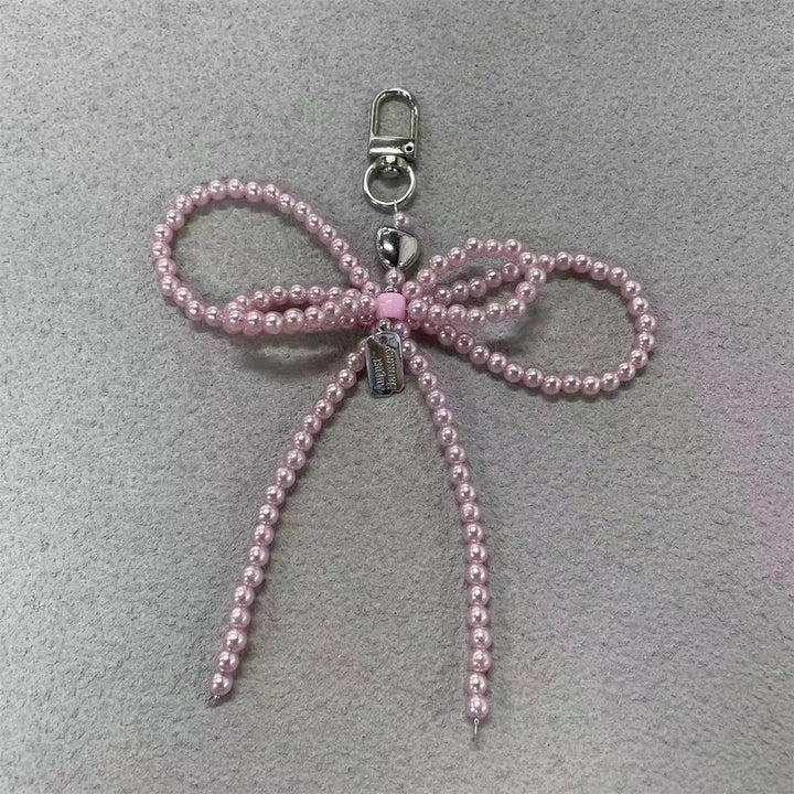 Elegant Pearl Bow Keychain Stornfield