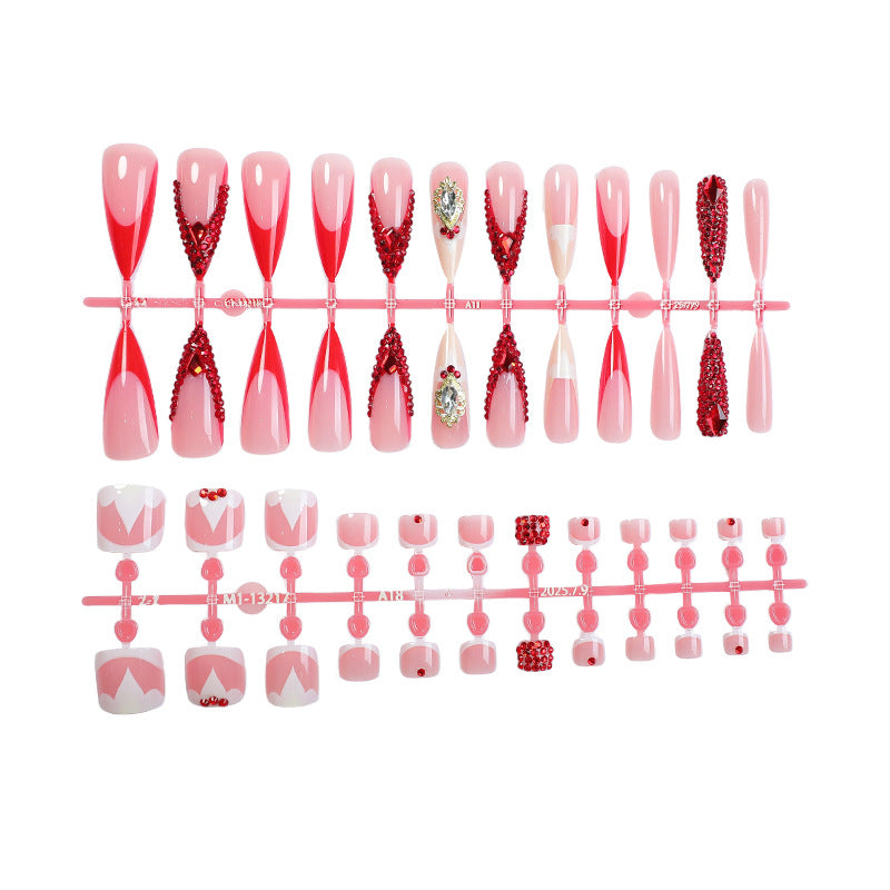 Artificial nail set with sparkling rhinestone accents and romantic motifs Stornfield
