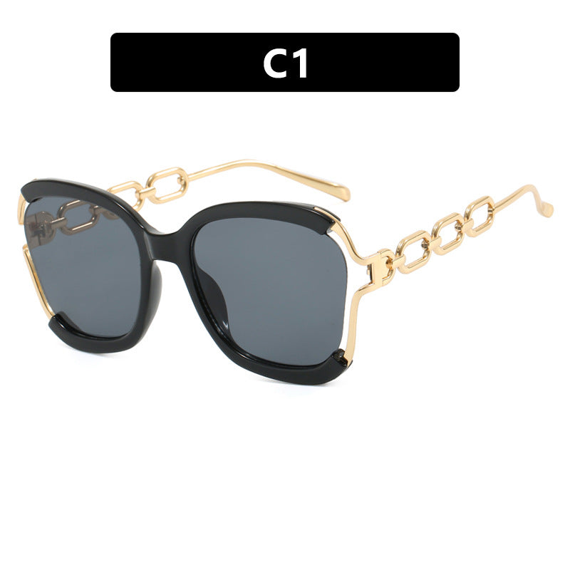 Ladies fashionable sunglasses with golden chain details Stornfield
