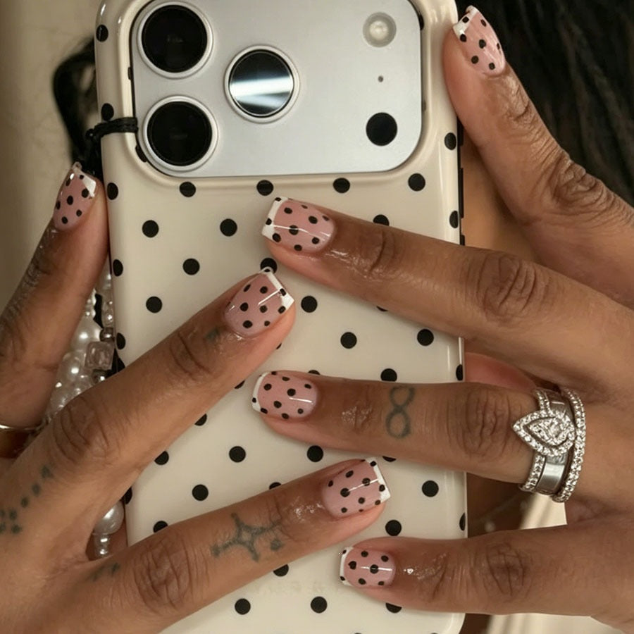 Artificial nail set with elegant dots and French tips Stornfield