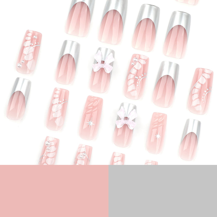 Glamorous artificial nails with elegant decorations Stornfield
