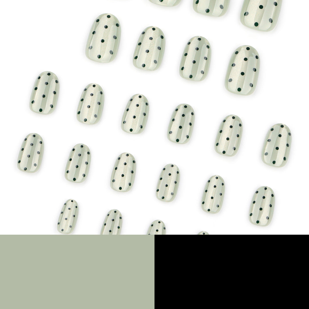 Creative Nail Art with Polka Dot Pattern Stornfield