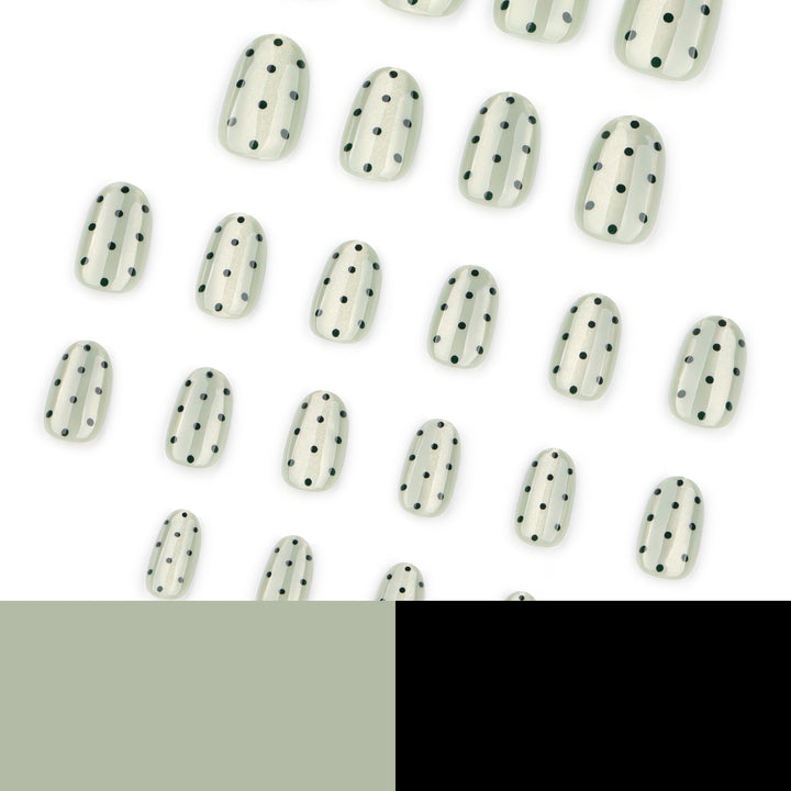Creative Nail Art with Polka Dot Pattern Stornfield