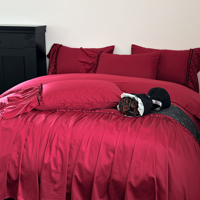 Elegant satin bedding set with pleated detail, jacquard design & ruffle