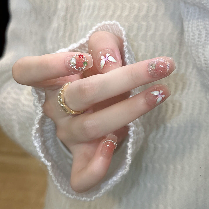 Decorative Press-On Nail Extensions with Floral Accents Stornfield