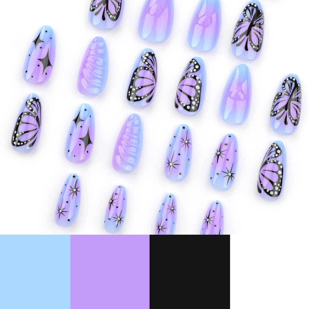 Artful stiletto nails with elegant butterfly design Stornfield