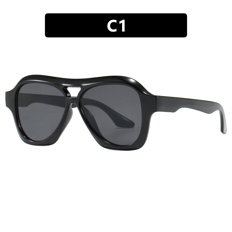 Ladies fashionable sunglasses in innovative design with wide frame Stornfield