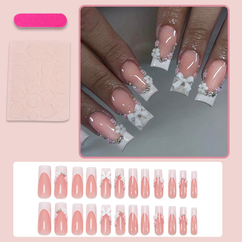 Acrylic Nail Set with Elegant Bows and Glitter Accents Stornfield