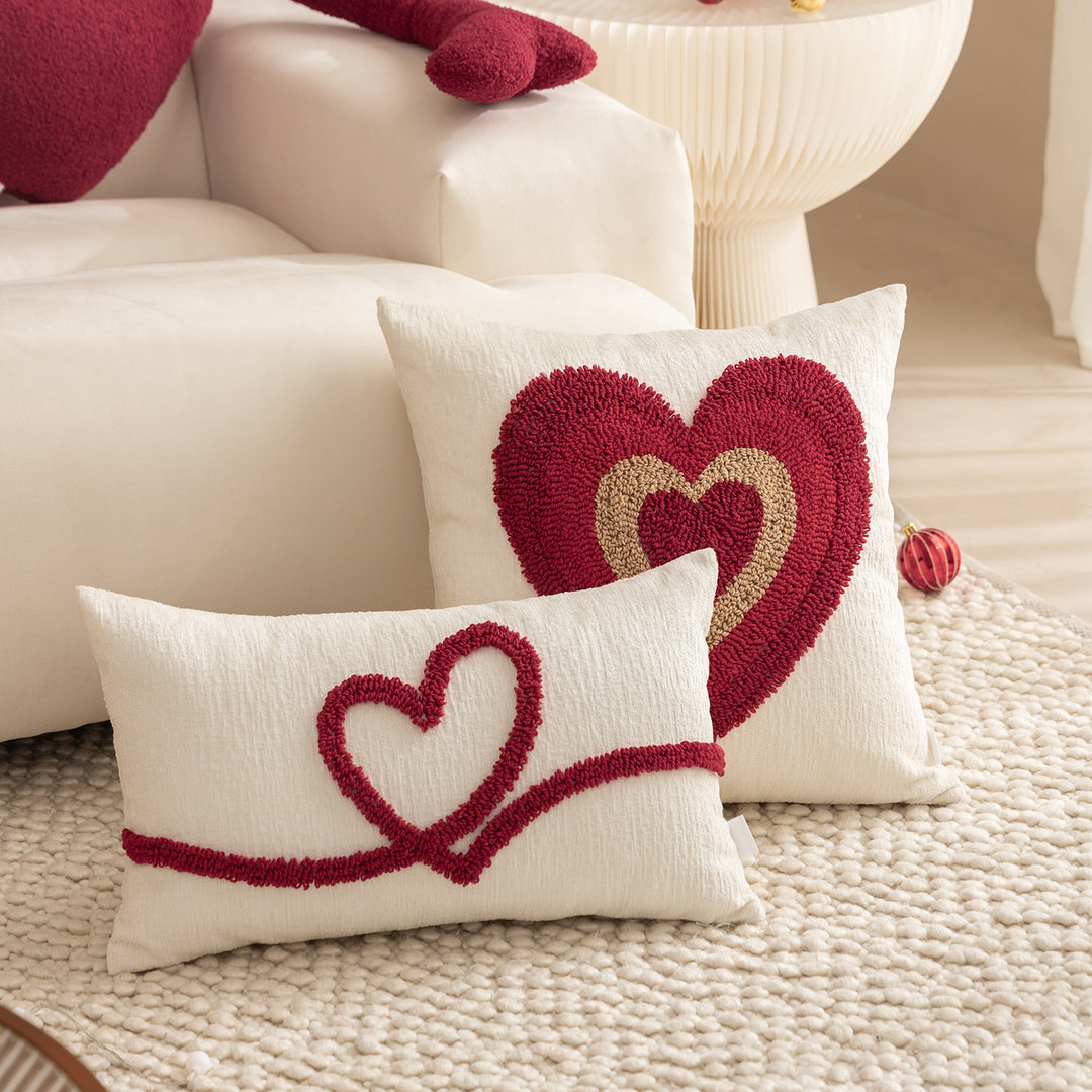 Heart-shaped cuddle cushion with extended arm applications Stornfield
