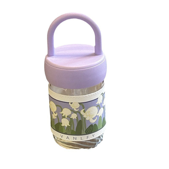 Women's insulated drinking bottle with ergonomic carrying handle and elegant flower design Stornfield