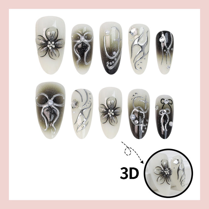 Artificial nails with elegant floral and glittering decorations Stornfield