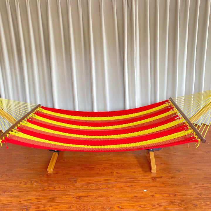 Woven cotton hammock with wooden spreader bars and freestanding stand Stornfield
