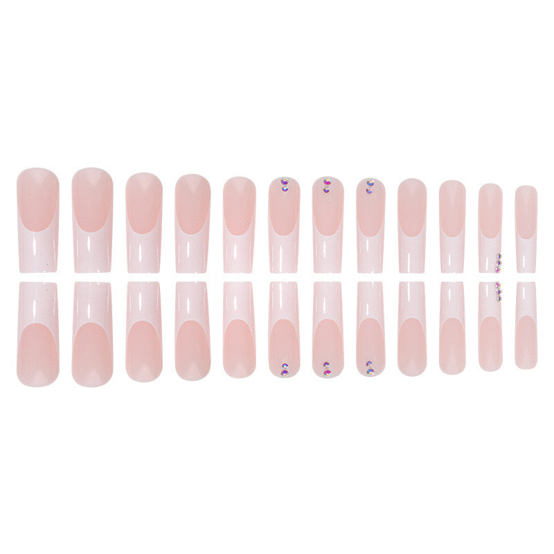Nail set with elegant French tips and sparkling rhinestone embellishments Stornfield