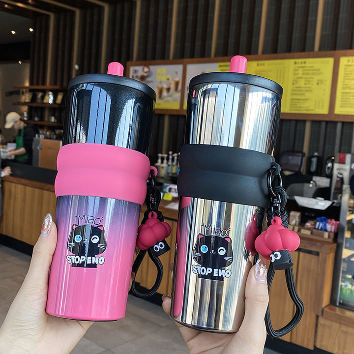 Women's playful coffee mug with silicone sleeve and integrated pendant Stornfield