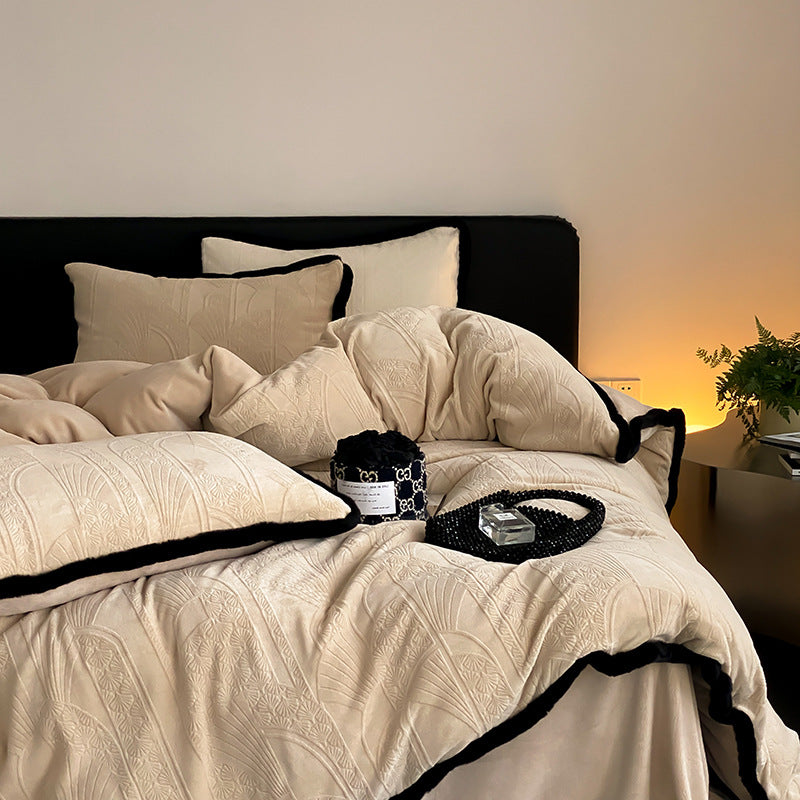 Quilted luxury bed set made of cotton blend with relief pattern and velvet trim