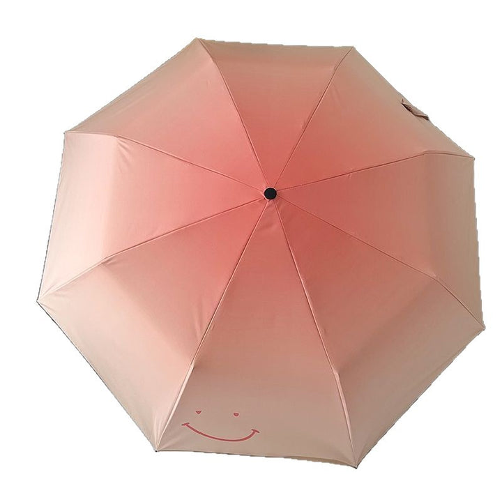 Women's foldable umbrella with playful design and handy wooden handle Stornfield