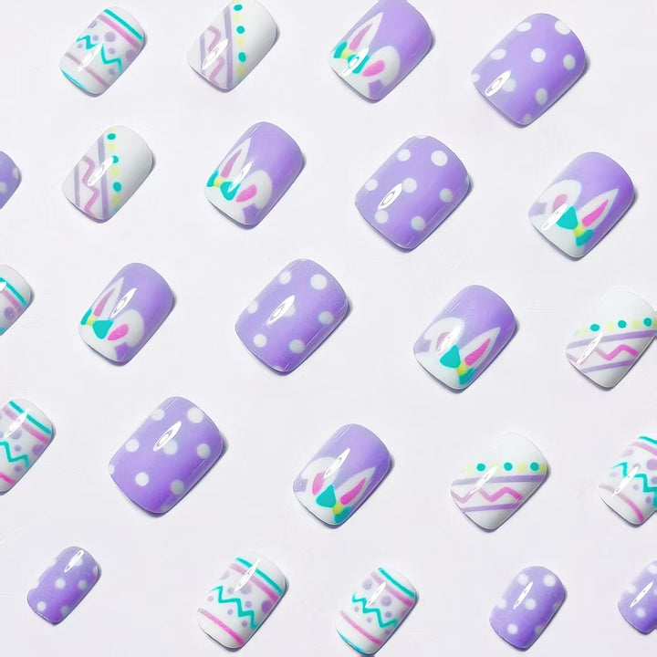 Artificial nails in creative Easter design Stornfield
