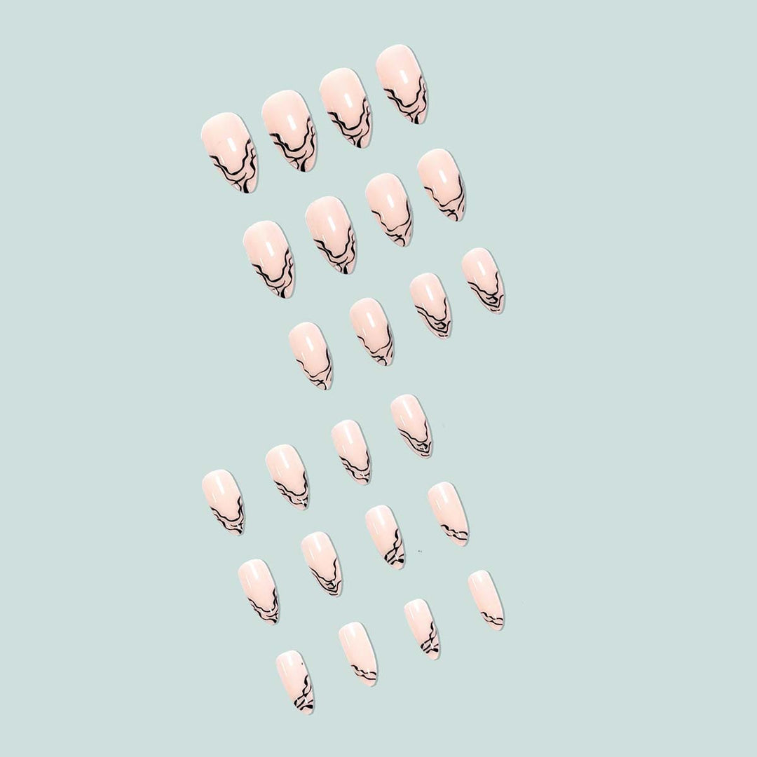 Artful stiletto nails with modern line patterns Stornfield