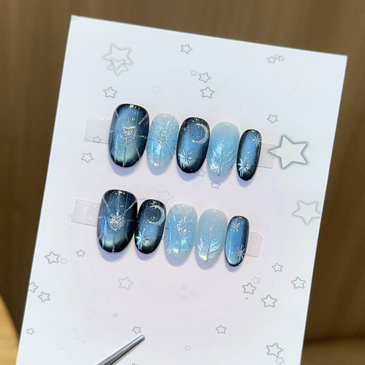 Glamorous artificial nail tips with star and glitter effects Stornfield