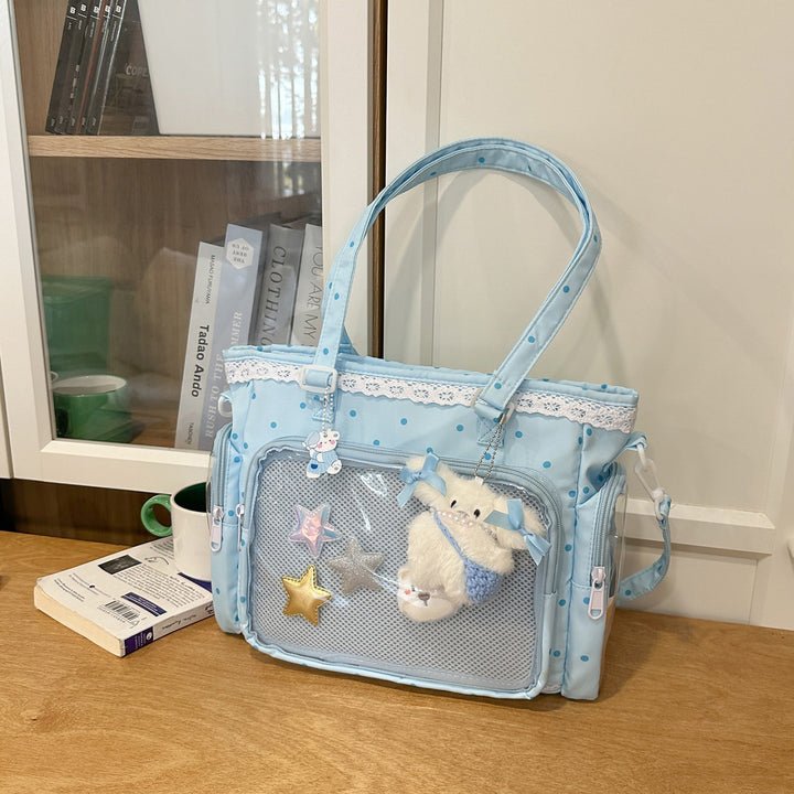 Handbag with Transparent Compartment Division and Playful Application Design Stornfield