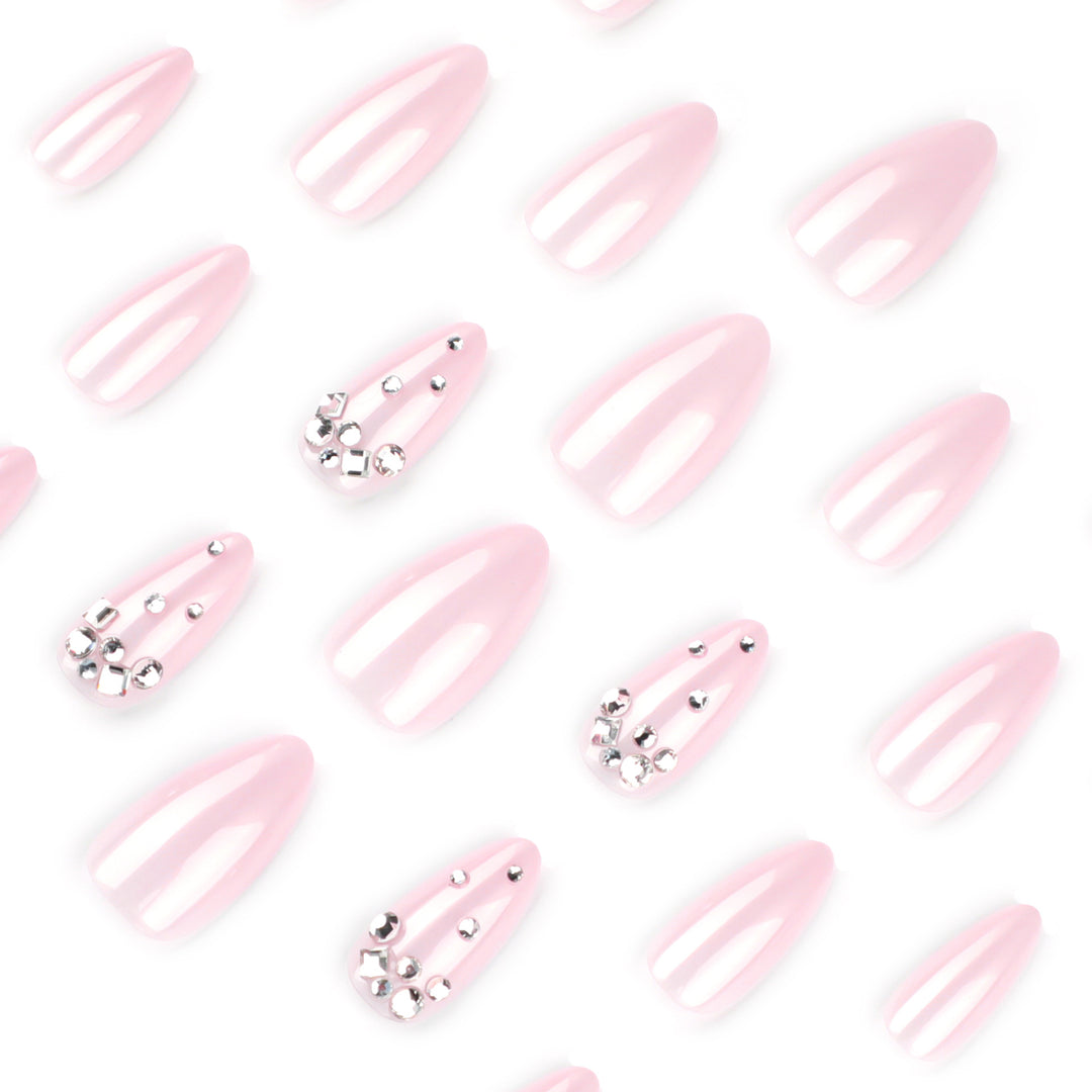 Artful nail art with delicate glitter accents and elegant French tip Stornfield