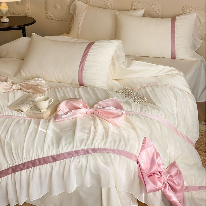 Bedding set with large satin bows, ruffled frill and decorative pillowcases