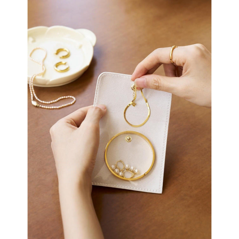 Jewelry storage bag made of high-quality material with transparent compartments Stornfield