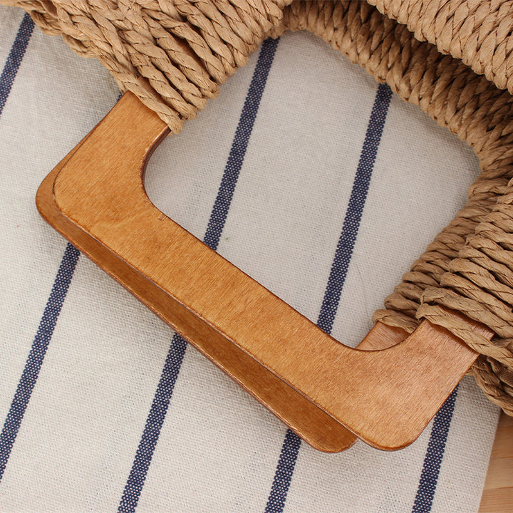 Braided beach bag with wooden handle Stornfield