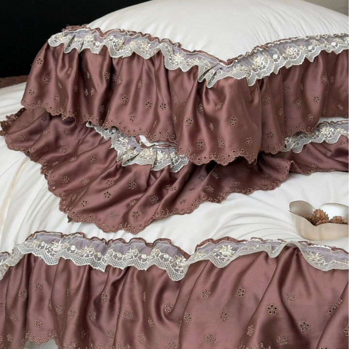 Luxurious satin-like duvet cover set with ruffles and lace trim