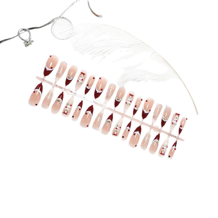 Artificial nails with festive designs and glitter accents Stornfield