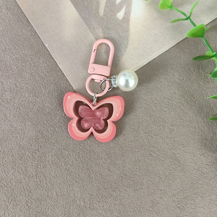 Keychain with butterfly and pearl accent Stornfield