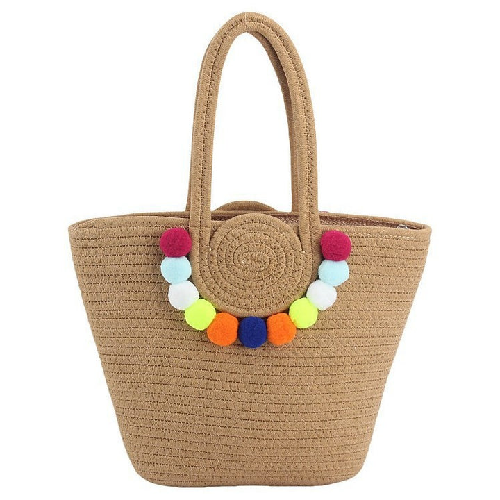Beach bag with cheerful pom poms Stornfield