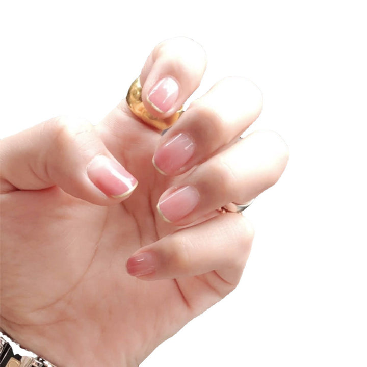 Artificial nails with glitter accents and natural finish Stornfield