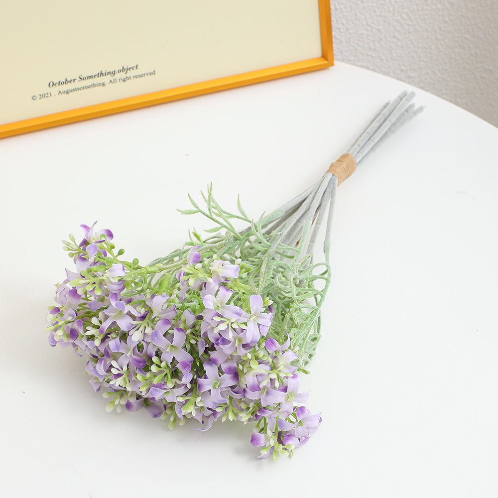 Decorative artificial flower arrangement