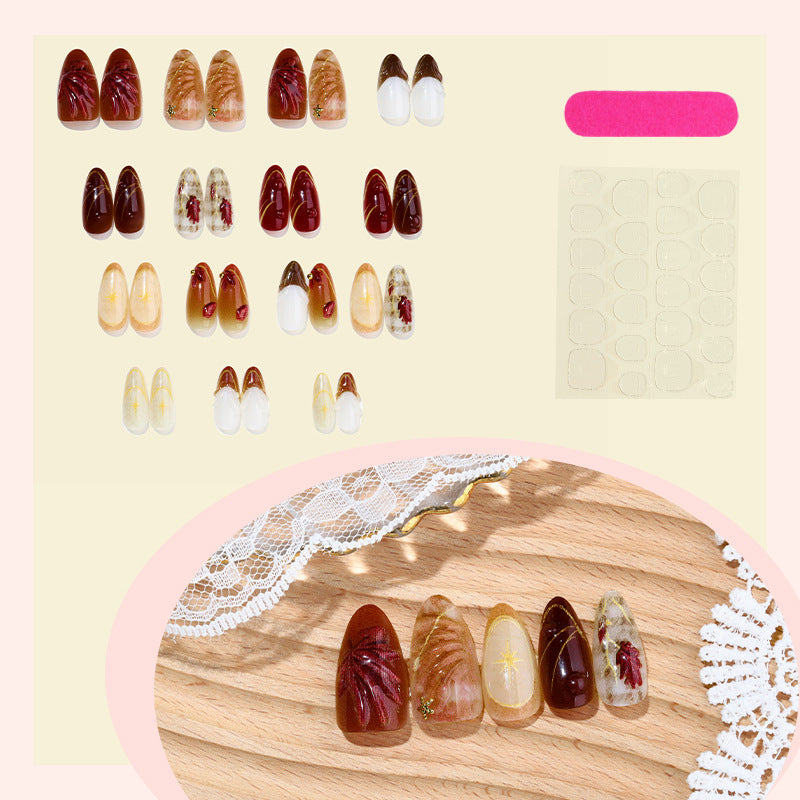 Nail set with elegant flower and glitter accents Stornfield