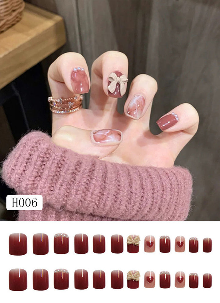 Artificial nail tips with bow design Stornfield
