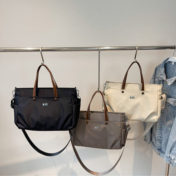 Shopping bag with comfortable carrying system and practical outer pockets Stornfield