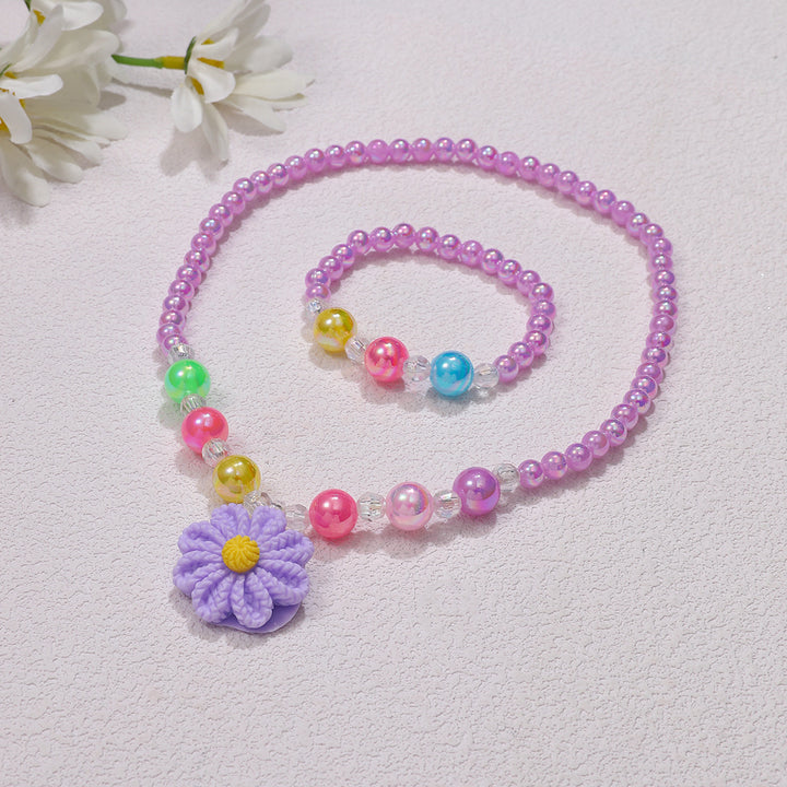 Playful jewelry set with flower pendant Stornfield